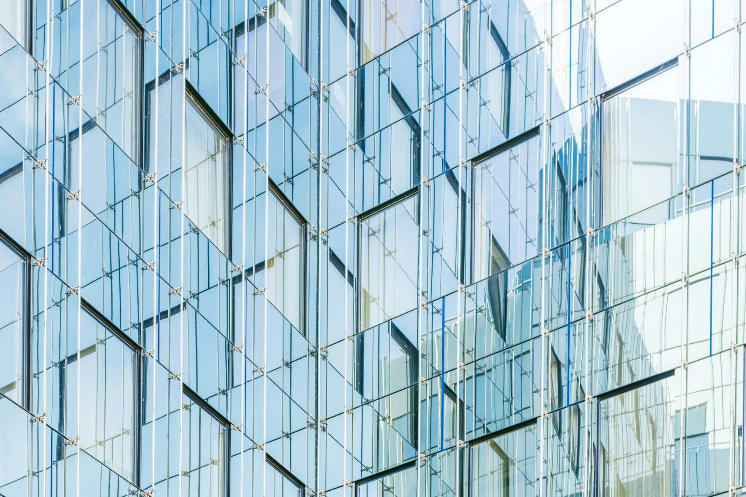Modern glass architecture reflecting an organized enterprise
