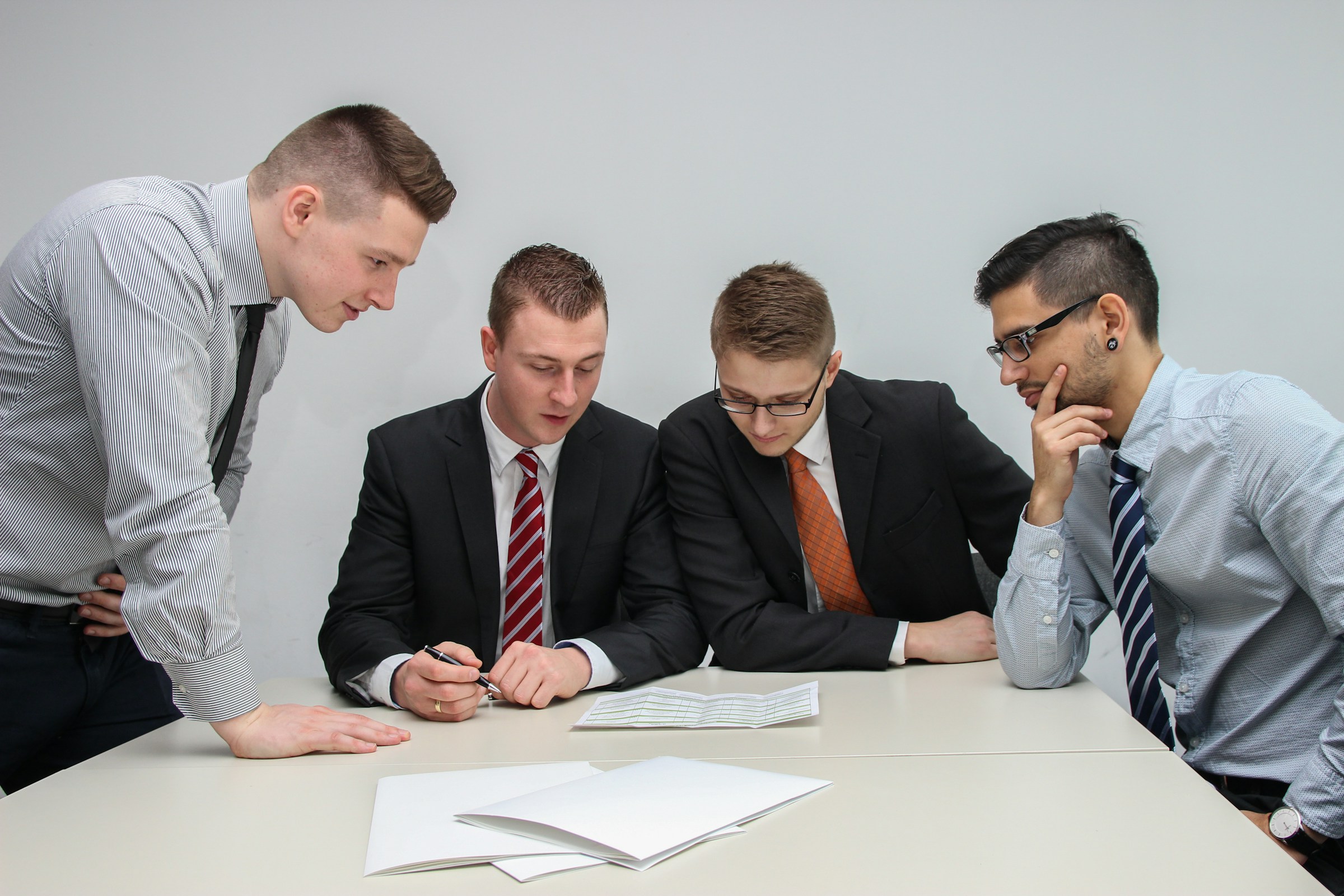 A team reviewing paperwork and coordinating next steps