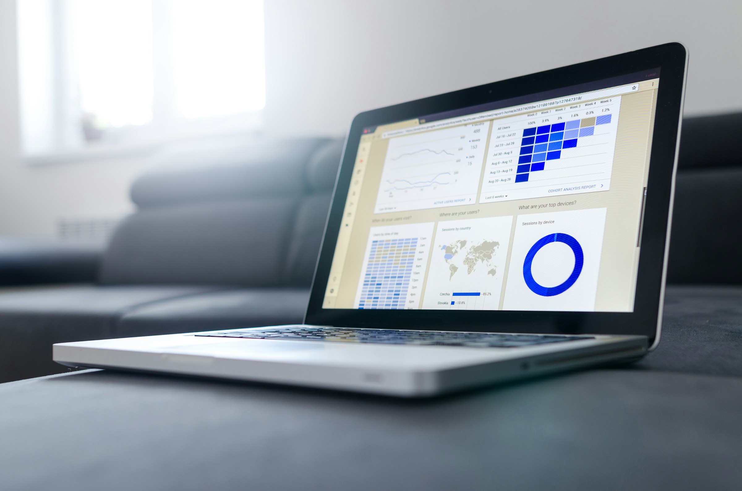 Analyst reviewing reports and financial information